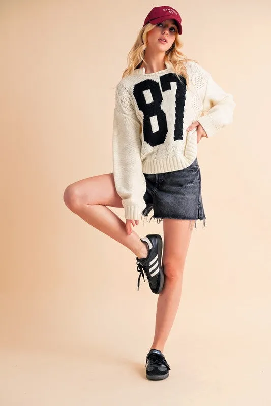 Aemi Co Contrast Number Cable Knit Drop Shoulder Sweater